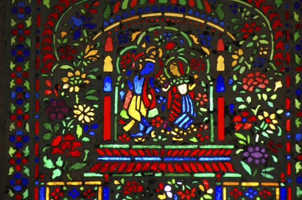 INDIA, Rajasthan, Jaipur, Colourful stained glass window in the Maharaja Man Singh Amber palace