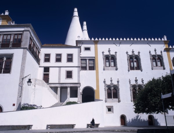 PORTUGAL, Sintra, "Palacio Nacional de Sintra facade and huge conical chimneys above, dating from