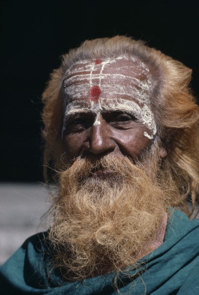 INDIA, Tamil Nadu, Tiruchirappalli, Head and shoulders portrait of a sadhu or holy man.