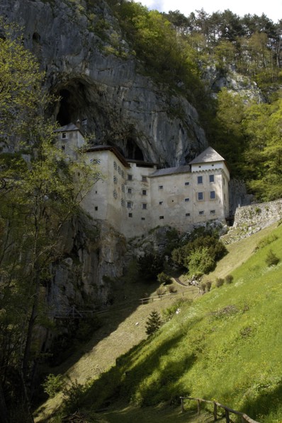 SLOVENIA, Predjama Castle, 16th Century castle built half way up 123M high cliff