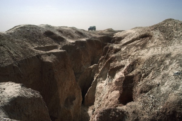 BURKINA FASO, Sahel, Landrover on ridge of land above old gold workings.