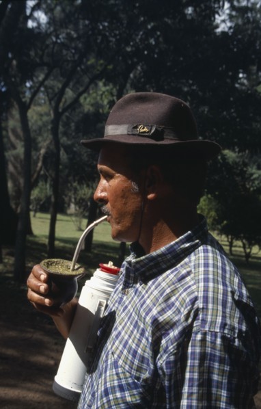 URUGUAY, Farming, Gaucho drinking mate a traditional South American herbal drink made from yerba.
