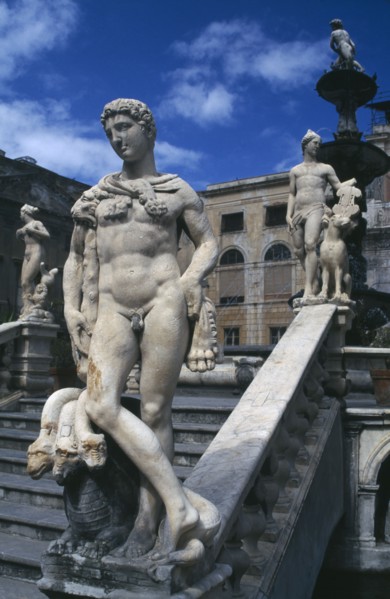 ITALY, Sicily, Palermo, Classical statuary and staircase.