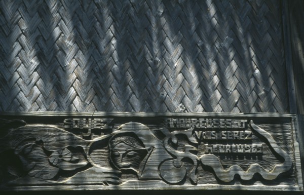 PACIFIC ISLANDS, Polynesia, French Polynesia, Marquesas.  Hiva Oa.  Carved wooden inscription on