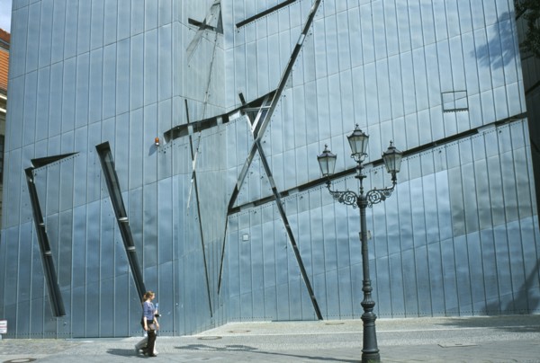 GERMANY, Berlin, Visitors walking past the zinc clad facade of the Jewish Museum designed by Polish