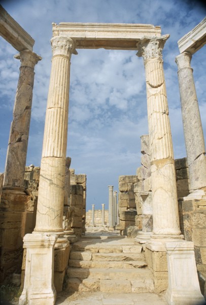 LIBYA, Tripolitania, Leptis Magna, Ruins of Roman city founded in 6th Century BC.  Carved columns