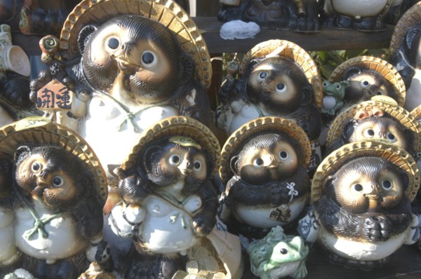 JAPAN, Honshu, Ibaragi, "Mashikoi. Ceramic tanuki or racoon dog, traditional welcoming symbol