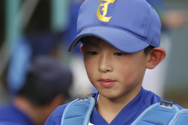JAPAN, Chiba, Tako, "Yuki Katsumata, catcher for Toujou Shonen Yakyu (baseball) Club"