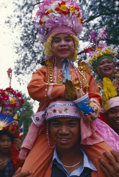 THAILAND, Chiang Mai, Shan Poi San Long. Crystal Children ceremony with Luk Kaeo in costume sitting