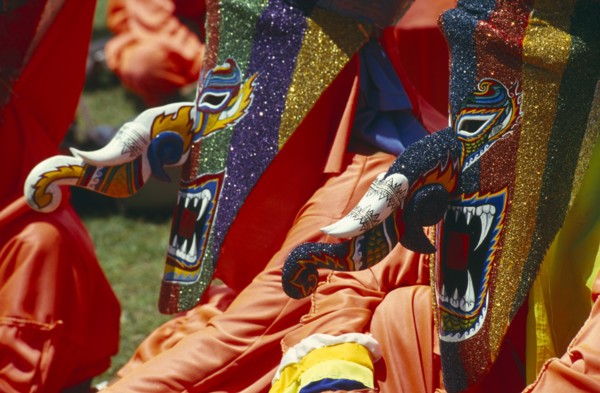 THAILAND, Loei Province, Dan Sai, Phi Ta Khon or Spirit Festival. People wearing brightly coloured