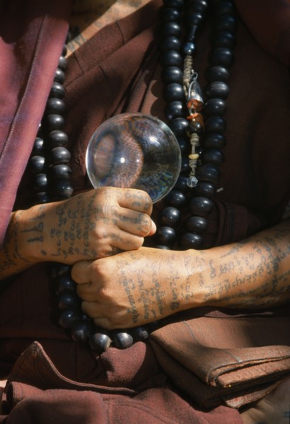 THAILAND, Wat Phra Acha Tong, Cropped vew of Buddhist monk from The Golden Horse Forest Monastery