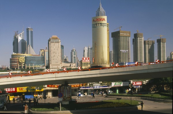 CHINA, Shanghai, "View of Pudong from the Bund.  Elevated roadway, shops and skyscrapers."