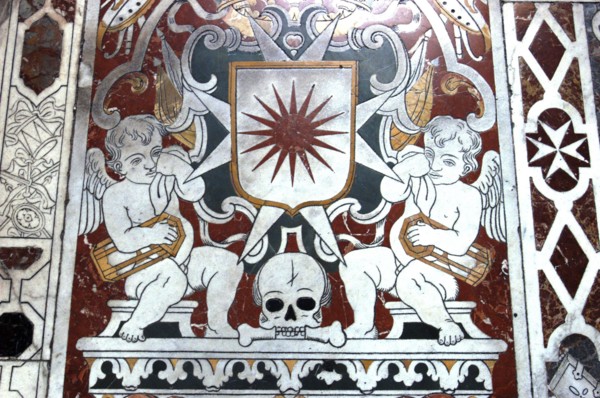 MALTA, Valletta , St Johns Cathedral. Detail of intricate marble inlaid tombstone forming part of a