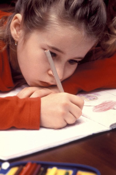 PEOPLE, Children, Girl drawing with coloured pencils