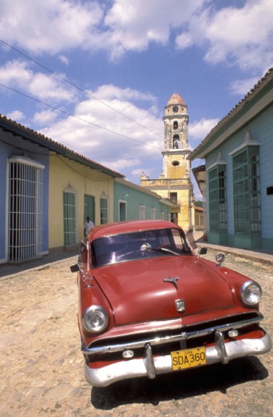CUBA, Trinidad, Classic American car parked in the street