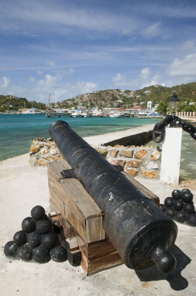 WEST INDIES, St Vincent & The Grenadines, Union Island, Ancient canon on the harbourside at Clifton