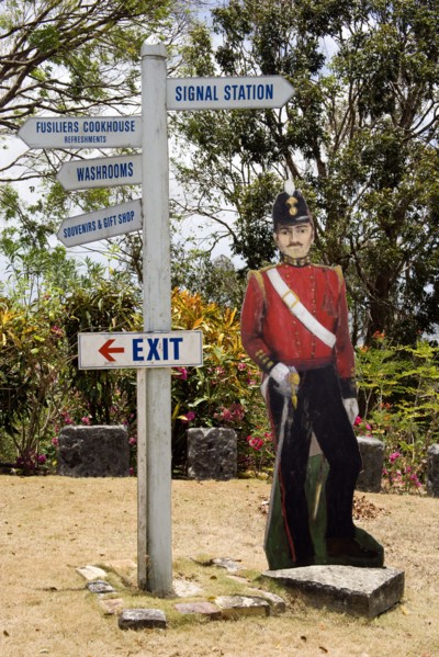 WEST INDIES, Barbados, St George, Signpost and cutout of British soldier at Gun Hill signal station