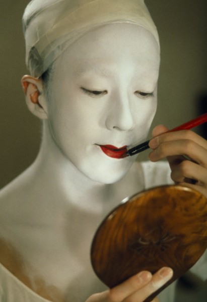JAPAN, Traditional Theatre, Kabuki actor applying make up.  Female actors are banned as immoral and
