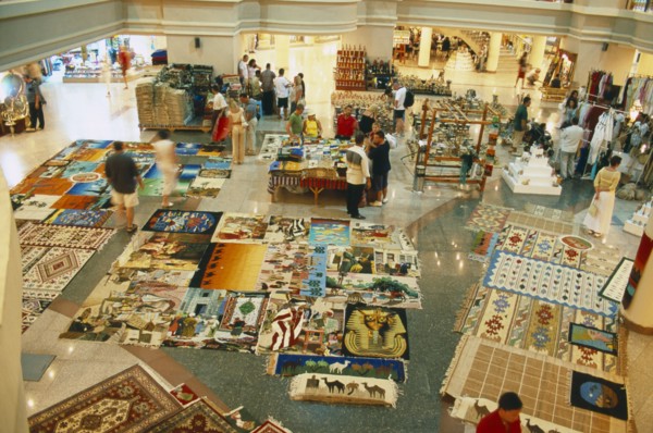 EGYPT, Red Sea Coast, Sharm el Sheikh, "Naama Bay shopping centre, carpets laid out on display."