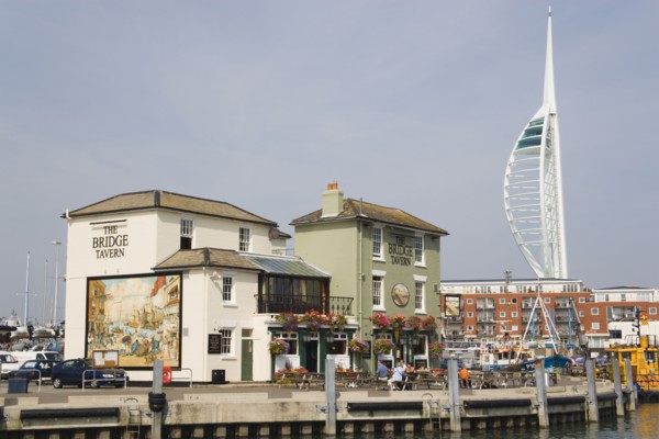 ENGLAND, Hampshire, Portsmouth, The Camber in Old Portsmouth showing the Spinnaker Tower behind the