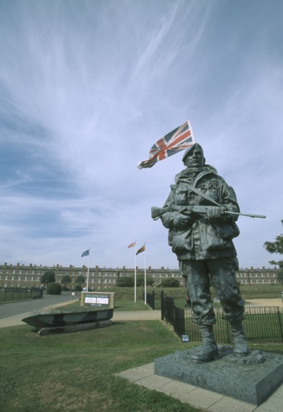 ENGLAND, Hampshire, Portsmouth, Royal Marines Museum. Large statue of a Royal Marine holding gun on
