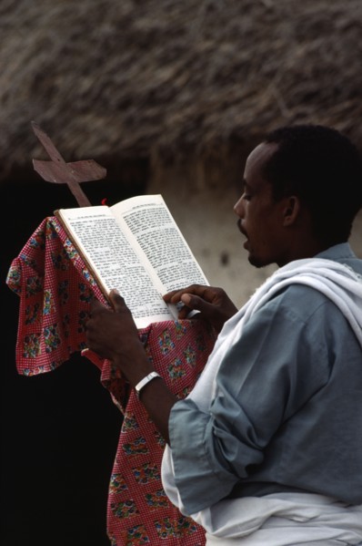 SUDAN, East, Religion, Coptic priest conducting othodox service.