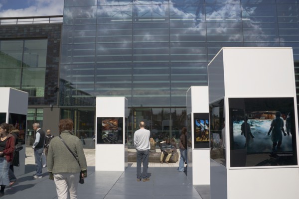 ENGLAND, East Sussex, Brighton, Photographic exhibition of Tsumani images outside the public