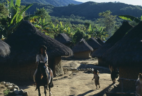 COLOMBIA, Sierra Nevada de Santa Marta, Avingue, "Parque Nacional. Kogi Wiwa leader riding his