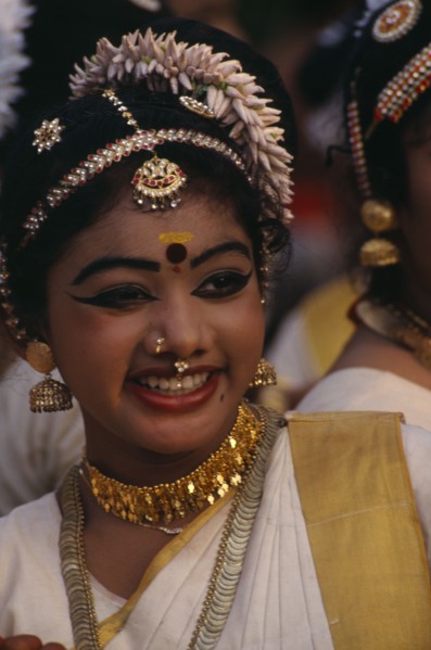 INDIA, Kerala, Thiruvananthapuram, "Mohiniyattam dancer at The Great Elephant March festival. Hair