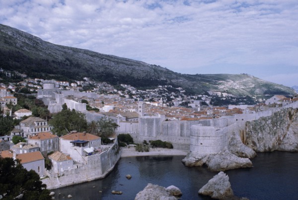 CROATIA, Dalmatia, Dubrovnik, View over the old city rooftops with the enclosed fortified walls