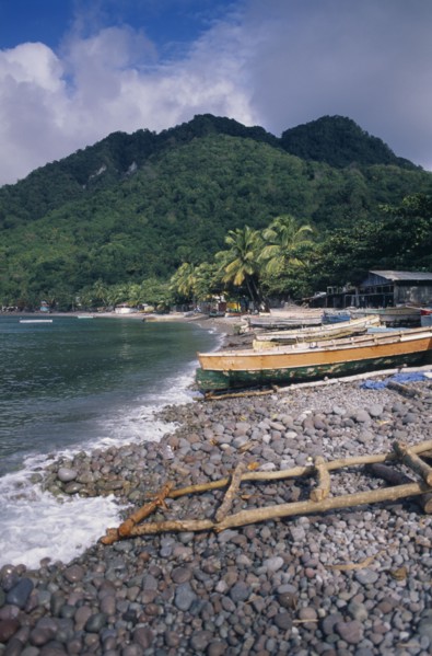 DOMINICA, Windward Islands, Soufriere Bay, Scotts Head fishing village. View across stoney beach