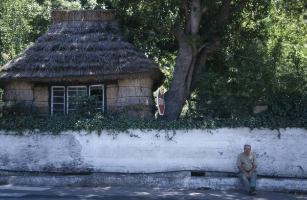 PORTUGAL, Madeira, Camacha, Traditional thatched cottage beside the Largo do Achada the central