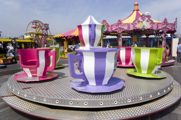 ENGLAND, Dorset, Bournemouth, Funfair ride of teapot and teacups on Bournemouth Pier