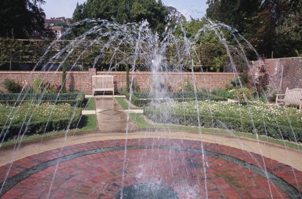 ENGLAND, East Sussex, Lewes, Southover Grange Gardens. Walled garden with central water fountain