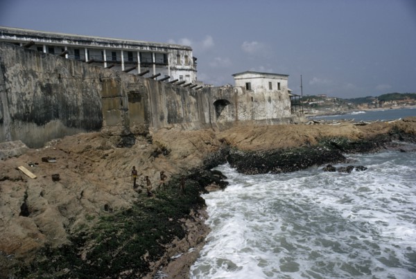GHANA, Cape Coast, Cape Coast Castle.  Line of cannons along seventeenth century castle ramparts