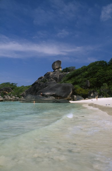 THAILAND, Koh Similan  , Sail Rock, View from the water’s edge of people on the sandy beach and