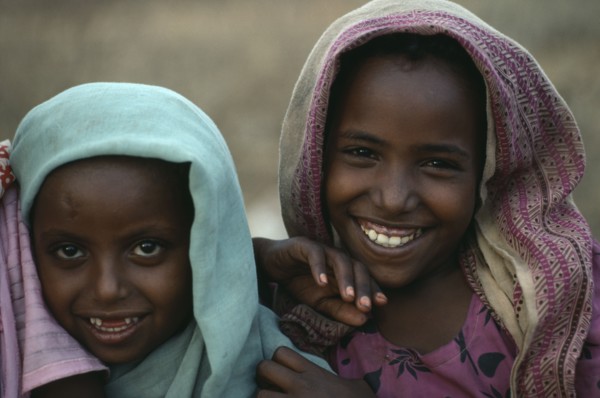 SUDAN, East, Tawawa Settlement, Head and shoulders portrait of two Ethiopian refugee girls.