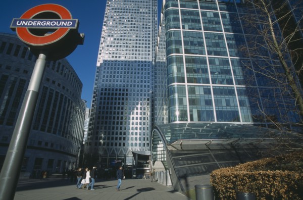 ENGLAND, London, Canary Wharf. View of the tower at 1 Canada Square with Underground in the
