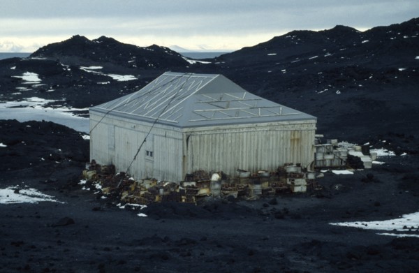 ANTARCTICA, Ross Island, "Shackleton’s Hut at Cape Royds,  with crates stacked around the sides of