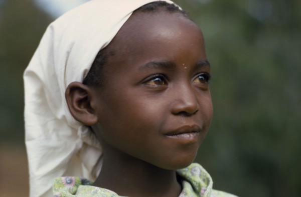 KENYA, Tribal People, "Head and shoulders portrait of young Kikuyu girl wearing headscarf, three
