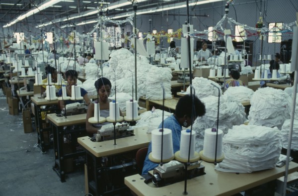 DOMINICAN REPUBLIC, Industry, Interior of clothing factory with female workers seated at machines.