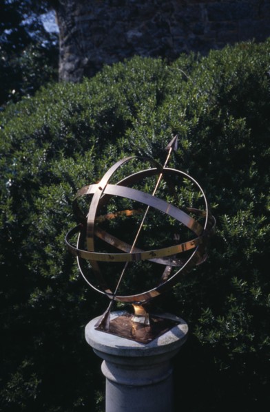 UNITED KINGDOM, Channel Islands, Guernsey, St Martins. Sausmarez Manor. Gold Sundial on plinth in