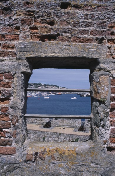 UNITED KINGDOM, Channel Islands, Guernsey, St Peter Port. Castle Cornet. View through battlement