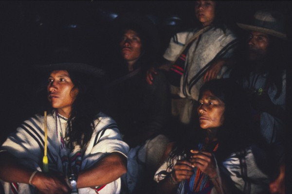 COLOMBIA, Santa Marta, Sierra Nevada , Ica family sat down and listening to Ica elder talking at