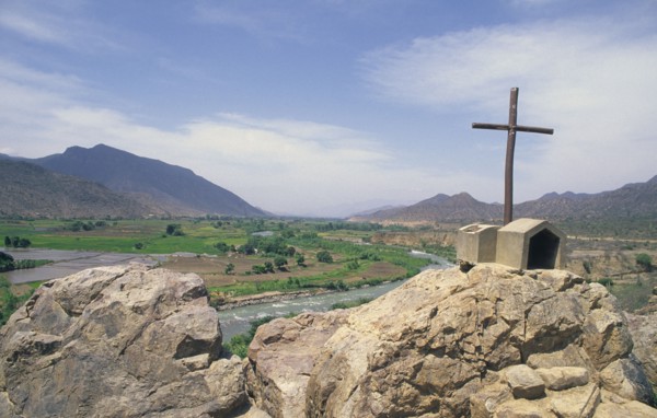 PERU, Northern, "Road side cross, with river and flood plain in back-ground on road from Cajamarca