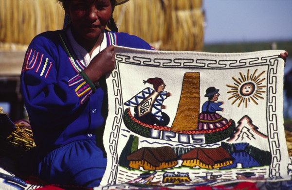 PERU, Puno Administrative Department, Lake Titicaca, "Uros floating islands/Aymara woman. The