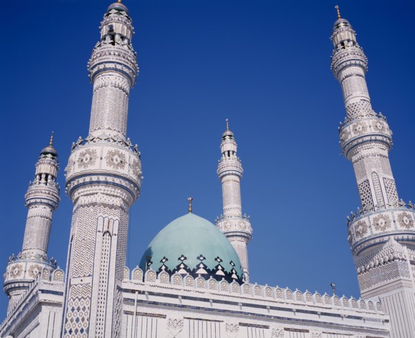 KUWAIT, Kuwait City, Iranian Mosque.  Part view of highly decorated facade of mosque showing domed
