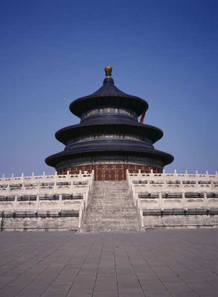 CHINA, Beijing, Temple of Heaven.  Hall of Prayer for Good Harvests with western tourist standing