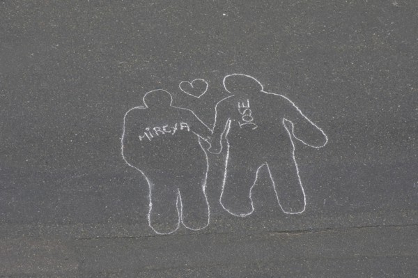 VENEZUELA, Caracas, Chalk outlines with the names of participants in an event on Avenida Francisco