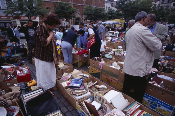 BELGIUM, Brabant, Brussels, "Flea Market. Place du Jeu de Balle, the Marolles. People rummaging